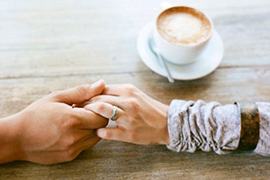 Coffee Holding Hands