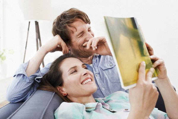 Reading Couple Laugh